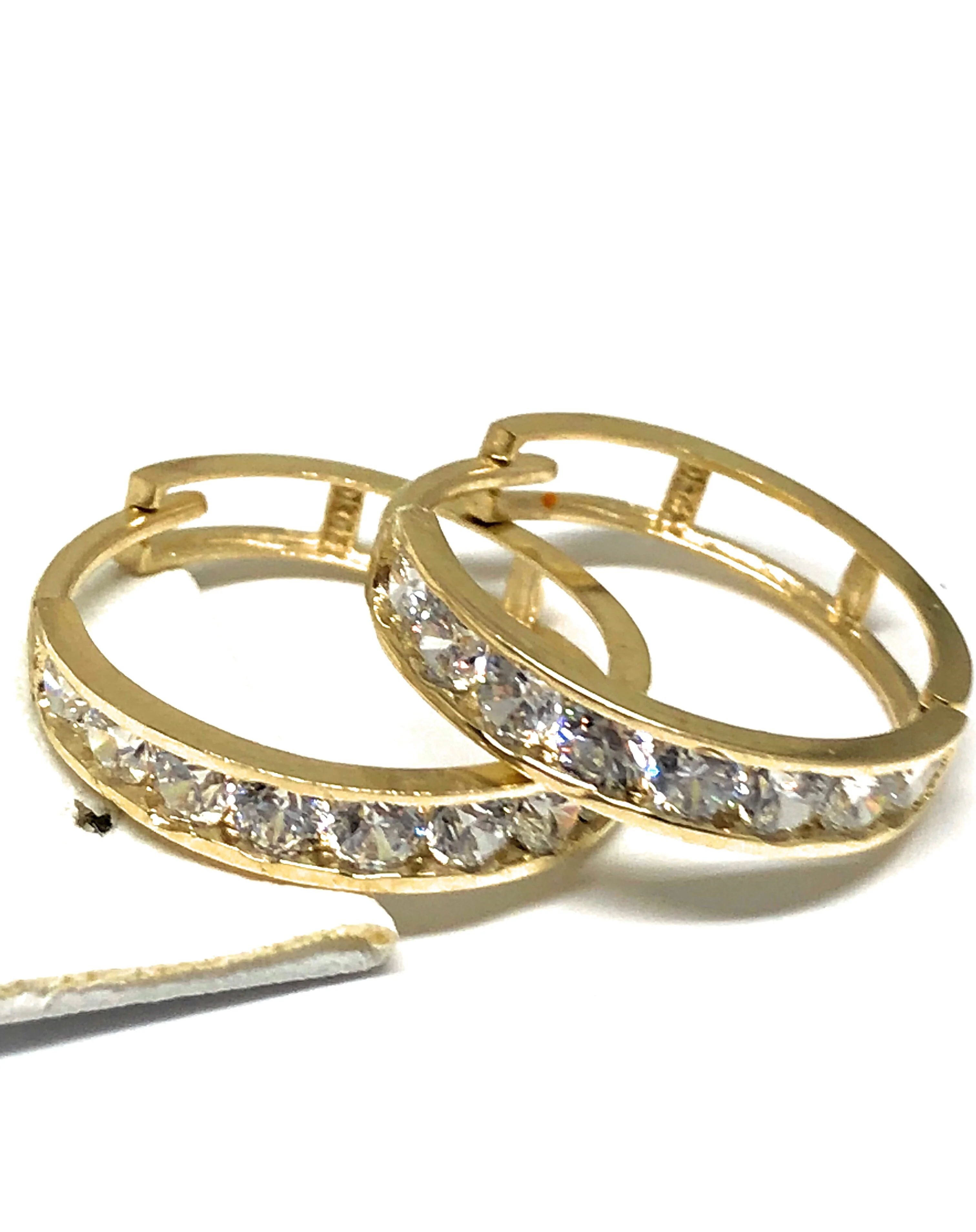 10k Solid Gold Cubic Zirconia Huggie Earrings - Image 4